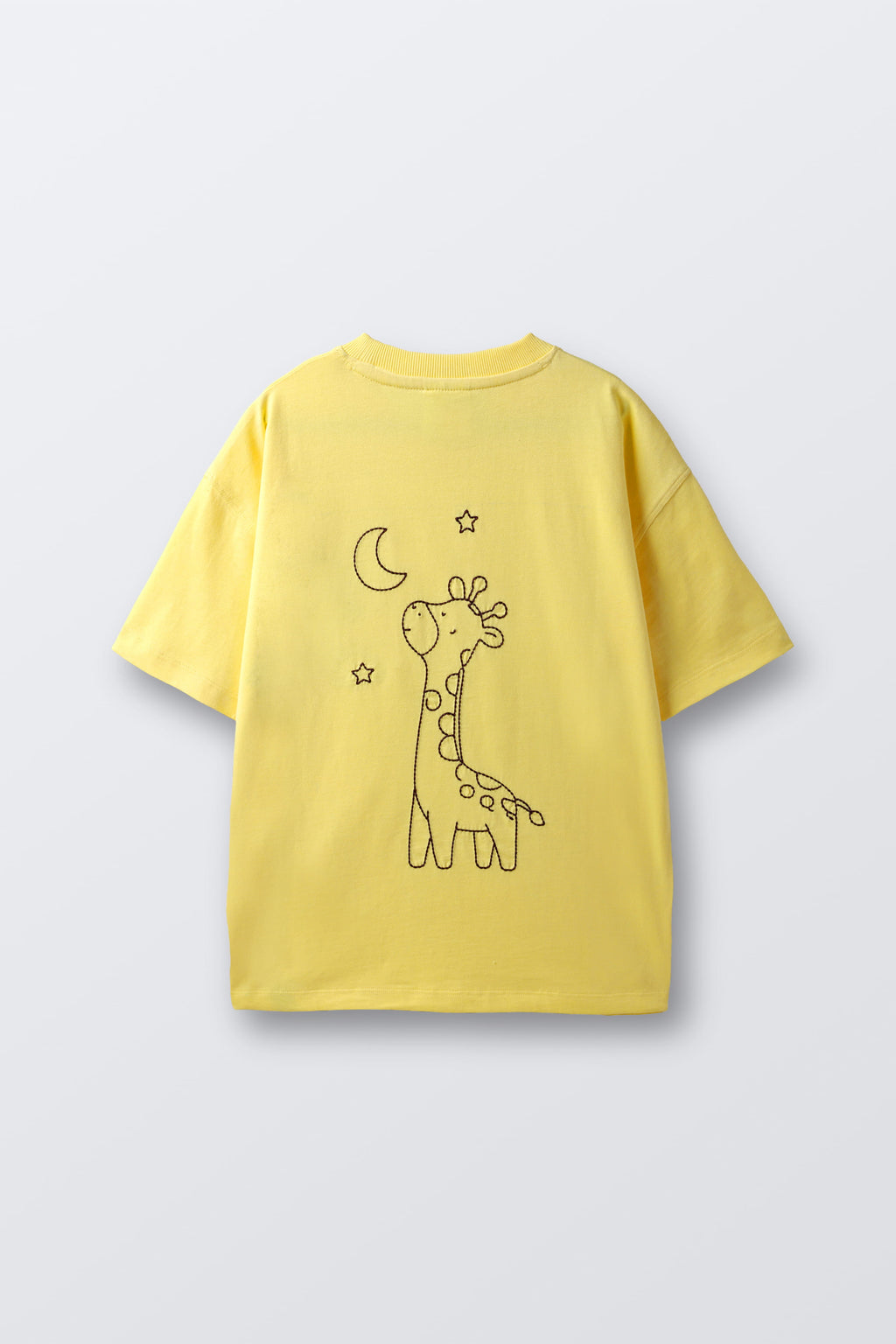 Yellow crewneck tee with large giraffe moon and star line-art embroidery on back