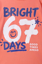 Coral graphic tee close-up of "BRIGHT 67 DAYS" text and numbers