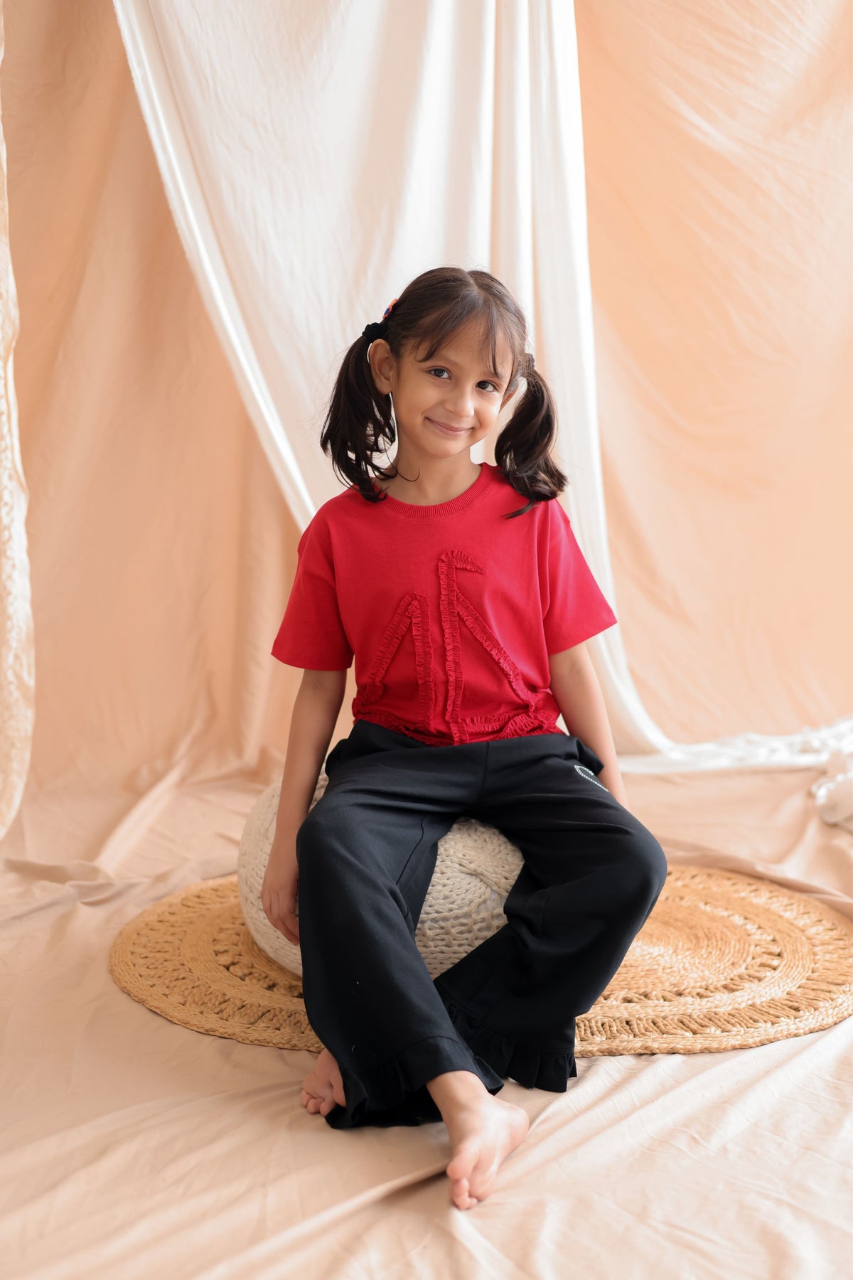 Red kids round-neck tee with boat-shaped textured applique