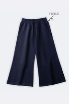 Navy fleece palazzo pants with elastic waistband and wide-leg silhouette, side pockets