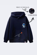 Navy hoodie with astronaut embroidery and rocket-dash graphic on chest