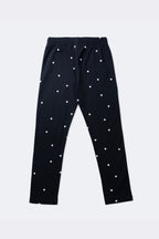 Girls' black stretch leggings with mini white heart all-over print and elastic waist