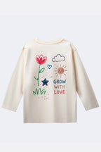 Off-white long-sleeve comfort tee with colorful floral “Grow with Love” back graphic