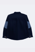 Boys navy corduroy shirt back view with printed elbow patches and gold button cuffs