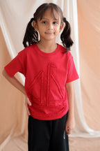 Red kids round-neck tee with boat-shaped self-fabric trim at chest