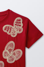 Red short-sleeve tee with white butterfly embroidery on chest and shoulder