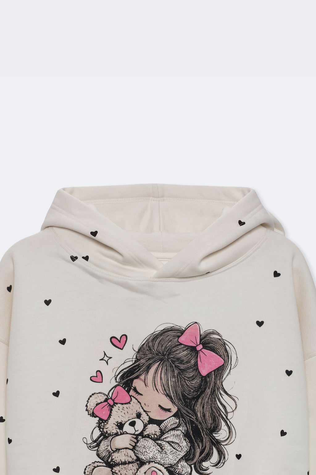 Off-white girls' hoodie close-up of teddy hug graphic with heart accents