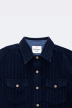 Boys navy corduroy button-up shirt with contrast inner collar and gold snap buttons