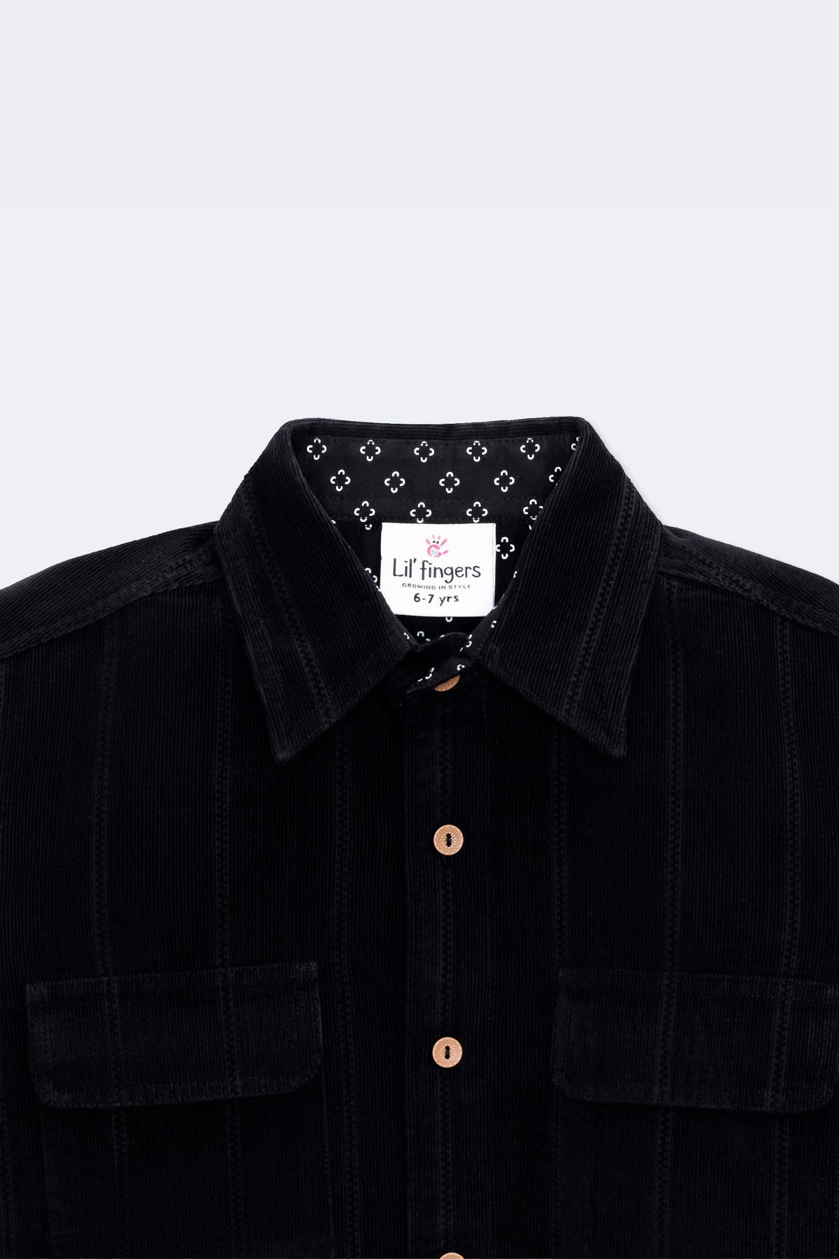 Black corduroy full-sleeve shirt, twin flap pockets and wooden-look buttons