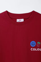 Red crewneck T-shirt with ribbed collar and COLOURS smiley graphic