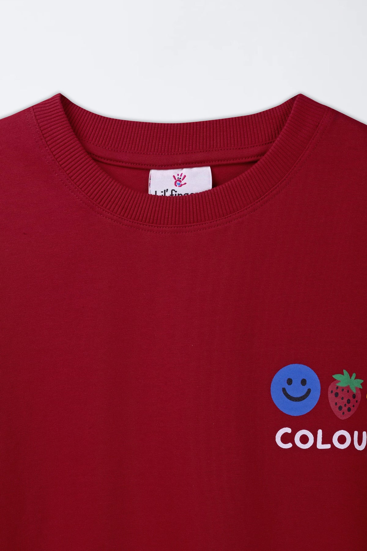 Red crewneck T-shirt with ribbed collar and COLOURS smiley graphic