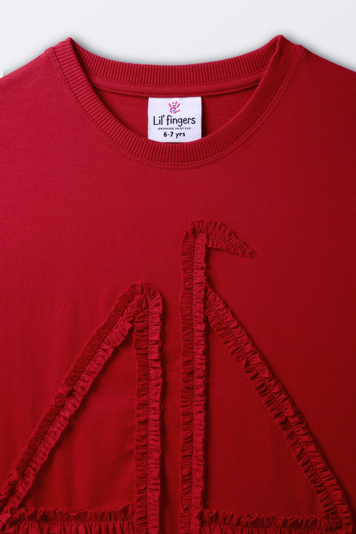 Red round-neck tee with Lil' fingers label and boat-shaped stitched trim
