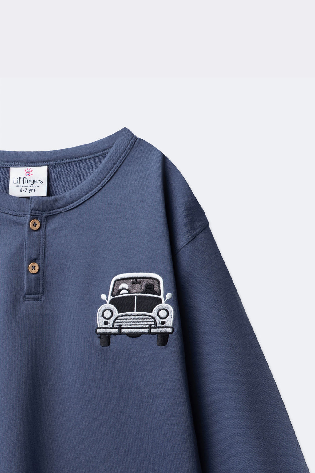 Boys denim blue terry henley long-sleeve with button placket and car embroidery