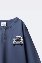 Boys denim blue terry henley long-sleeve with button placket and car embroidery