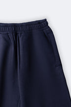 Navy fleece palazzo pants with elastic waistband and side pocket detail
