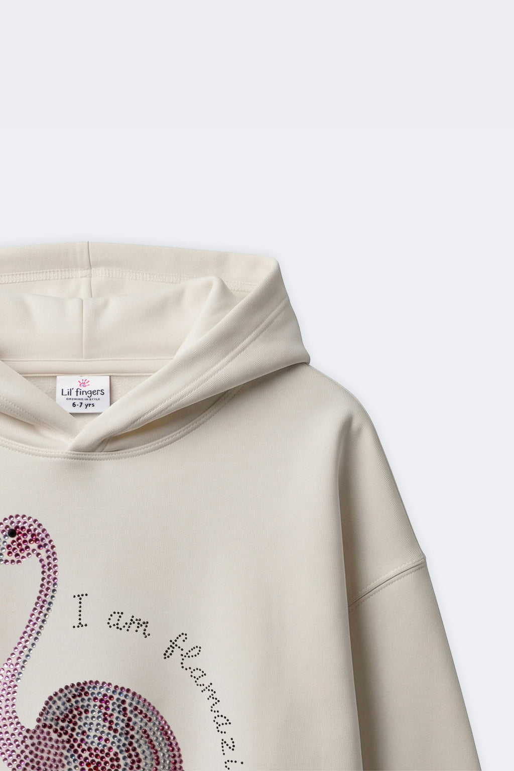 Ivory cream girls hoodie close-up of hood and embellished flamingo text