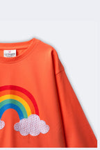 Girl’s coral long-sleeve T-shirt side view with rainbow and cloud embroidery