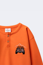 Boys orange henley T-shirt with off-road car embroidery and henley neckline buttons