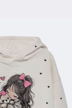 Off-white girls' hoodie sleeve close-up with small heart print