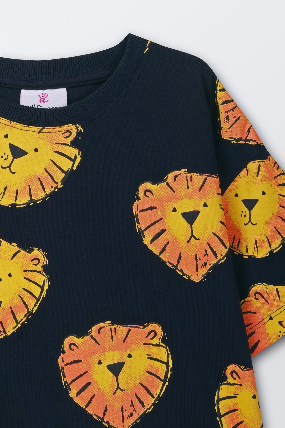 Navy oversized t-shirt with roaring lion face graphic on short sleeves