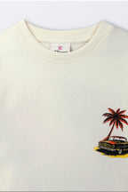 Cream T-shirt with ribbed crew neck and small chest palm tree car print