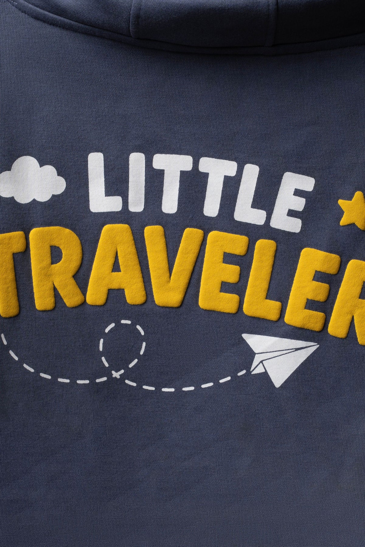 Denim blue kids hoodie detail: 'LITTLE TRAVELER' print with clouds and plane