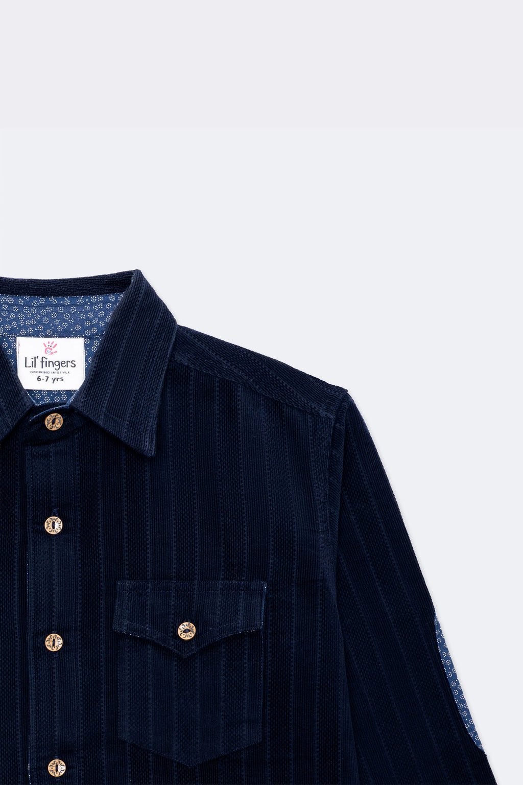 Boys navy corduroy button-up shirt with front flap pockets and contrast under-collar