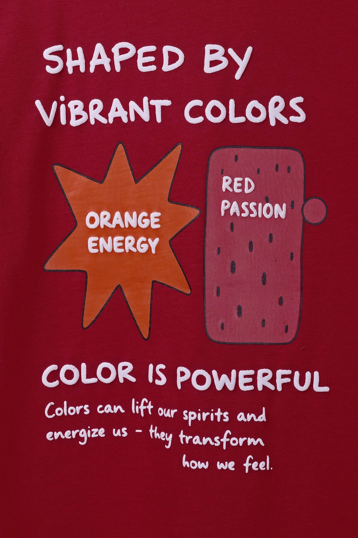 Red T-shirt back graphic with 'Shaped by Vibrant Colors' and icons