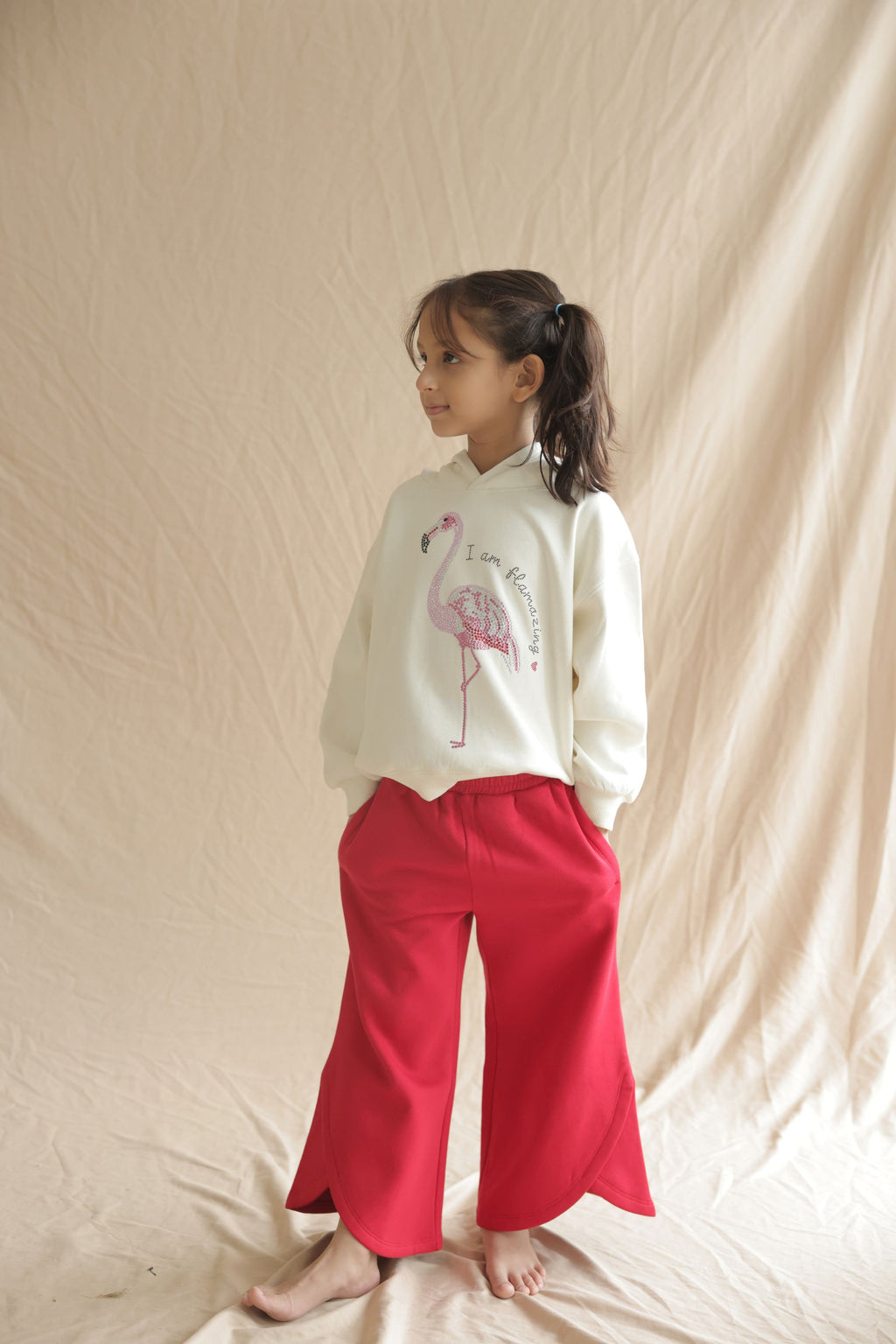Red 320 gsm fleece palazzo pants with elastic waistband and wide flared legs