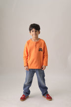 Boys orange henley T-shirt with off-road car pocket embroidery, worn by child