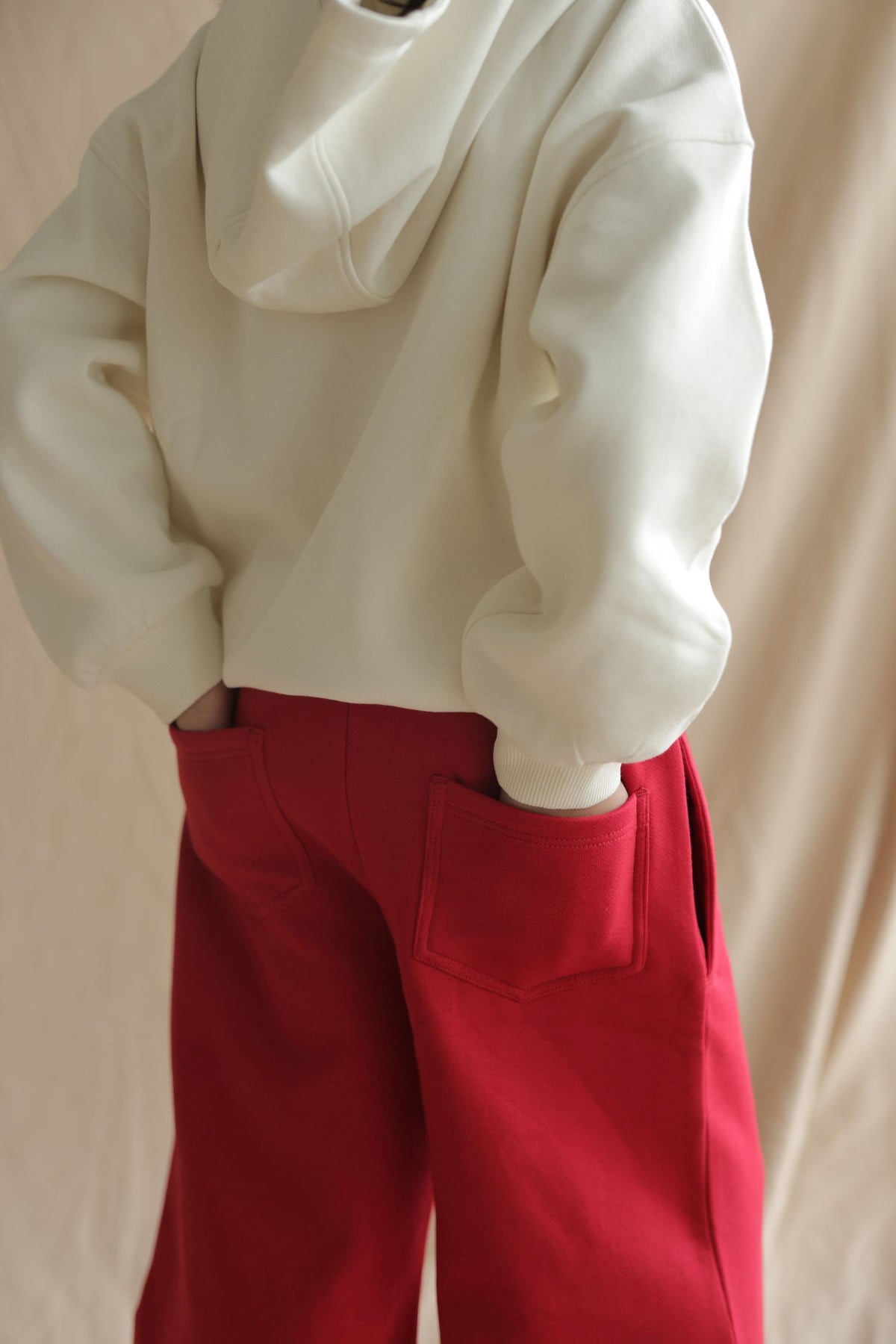 Red 320 gsm fleece palazzo pants with elastic waist and back patch pockets