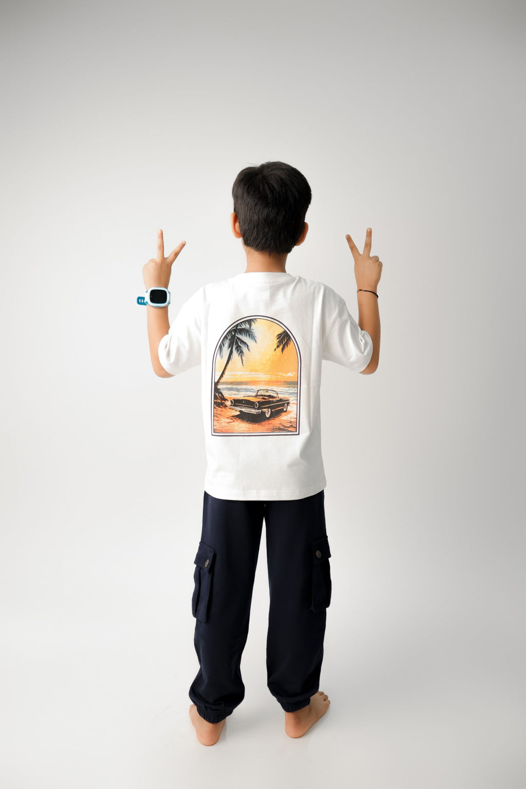 White T-shirt with large back framed sunset beach car and palm tree print