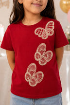 Red short-sleeve tee with three white embroidered butterflies and crew neckline