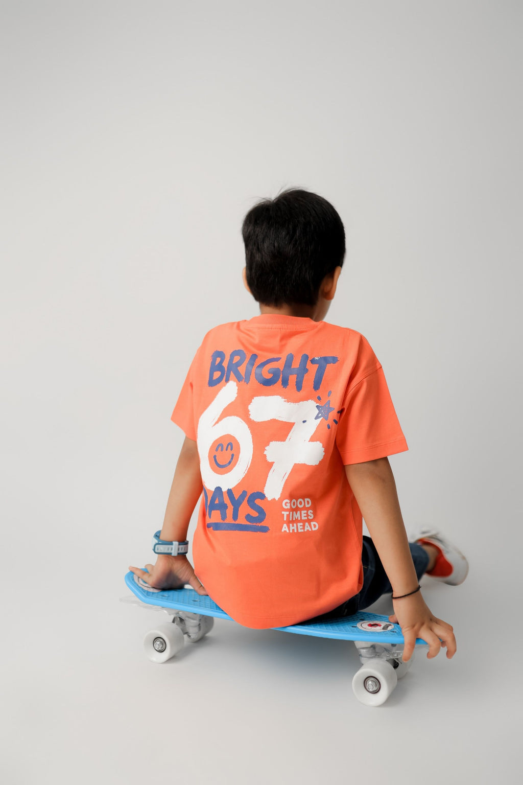 Coral graphic tee with back print "BRIGHT 67 DAYS" and "Good Times Ahead"