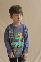 Dusty blue long-sleeve tee with Little Road Stories bus graphic on child