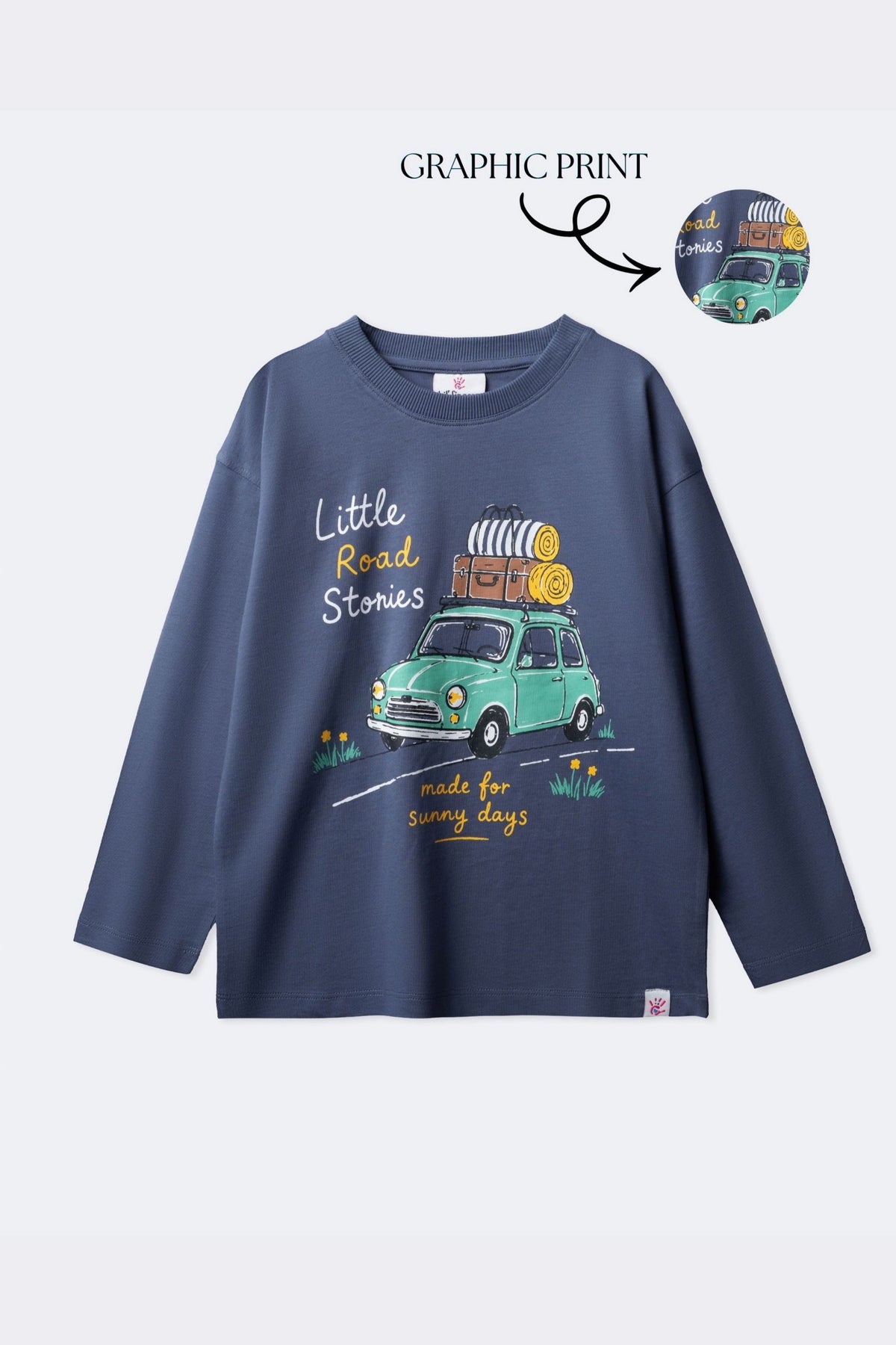 Blue long-sleeve comfort tee with Little Road Stories bus graphic print