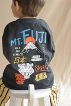 Black super-stretch t-shirt with back Mt. Fuji graphic, toddler wearing
