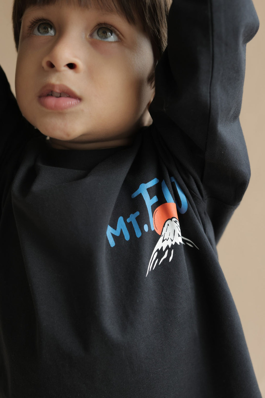 Black super-stretch t-shirt with blue Mt. Fuji graphic, toddler close-up