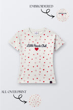 Off-white short-sleeve comfort tee with all-over red heart print and embroidered chest text