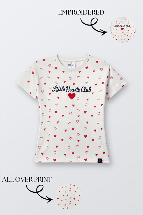 Off-white short-sleeve comfort tee with all-over red heart print and embroidered chest text