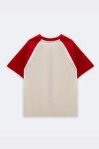 Plain cream raglan tee with red sleeves, no front graphic
