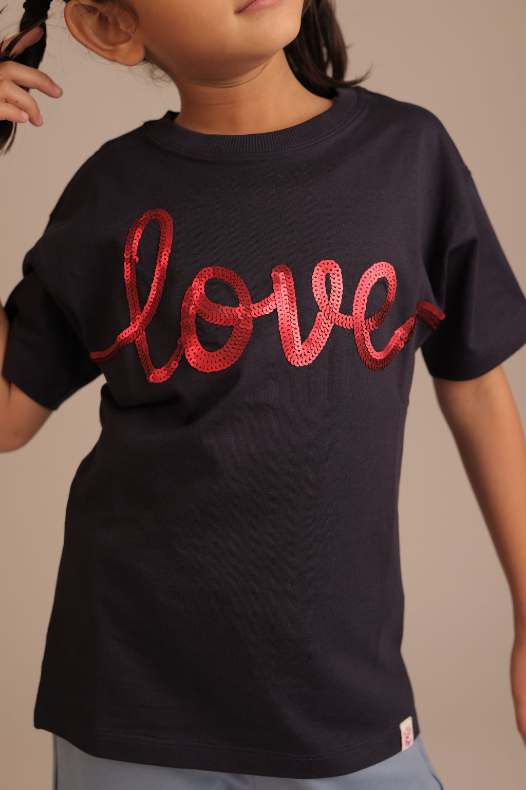 Navy kids' crewneck T-shirt with red 'love' script across chest