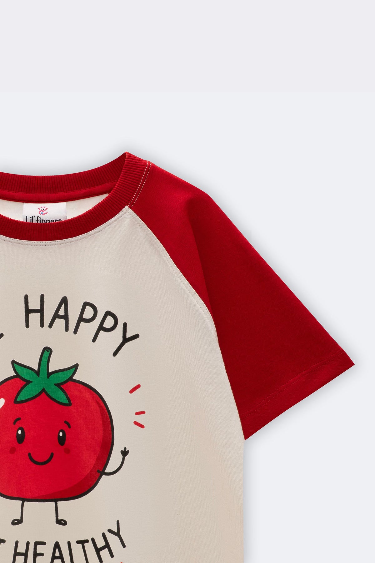 Cream raglan tee with red sleeves, partial tomato graphic on front