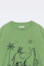Lime green kids comfort tee with elephant, palm tree, and sun line-art