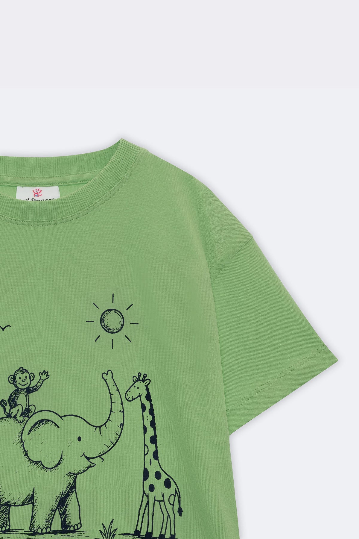Lime green kids tee sleeve with sun icon and jungle animal line art