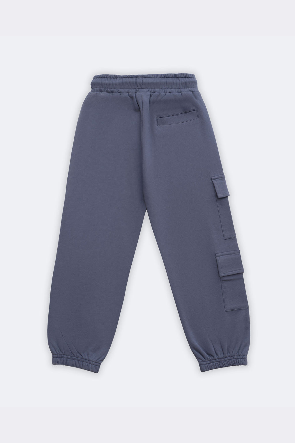 Denim blue track pants with drawstring waistband and side cargo patch pockets