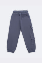 Denim blue track pants with drawstring waistband and side cargo patch pockets