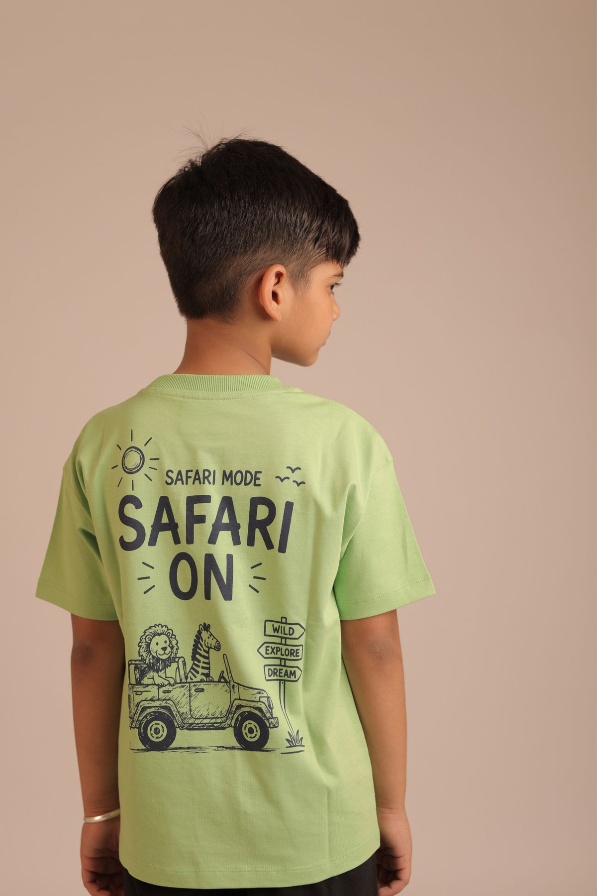 Lime green kids comfort tee with back "SAFARI ON" safari truck graphic