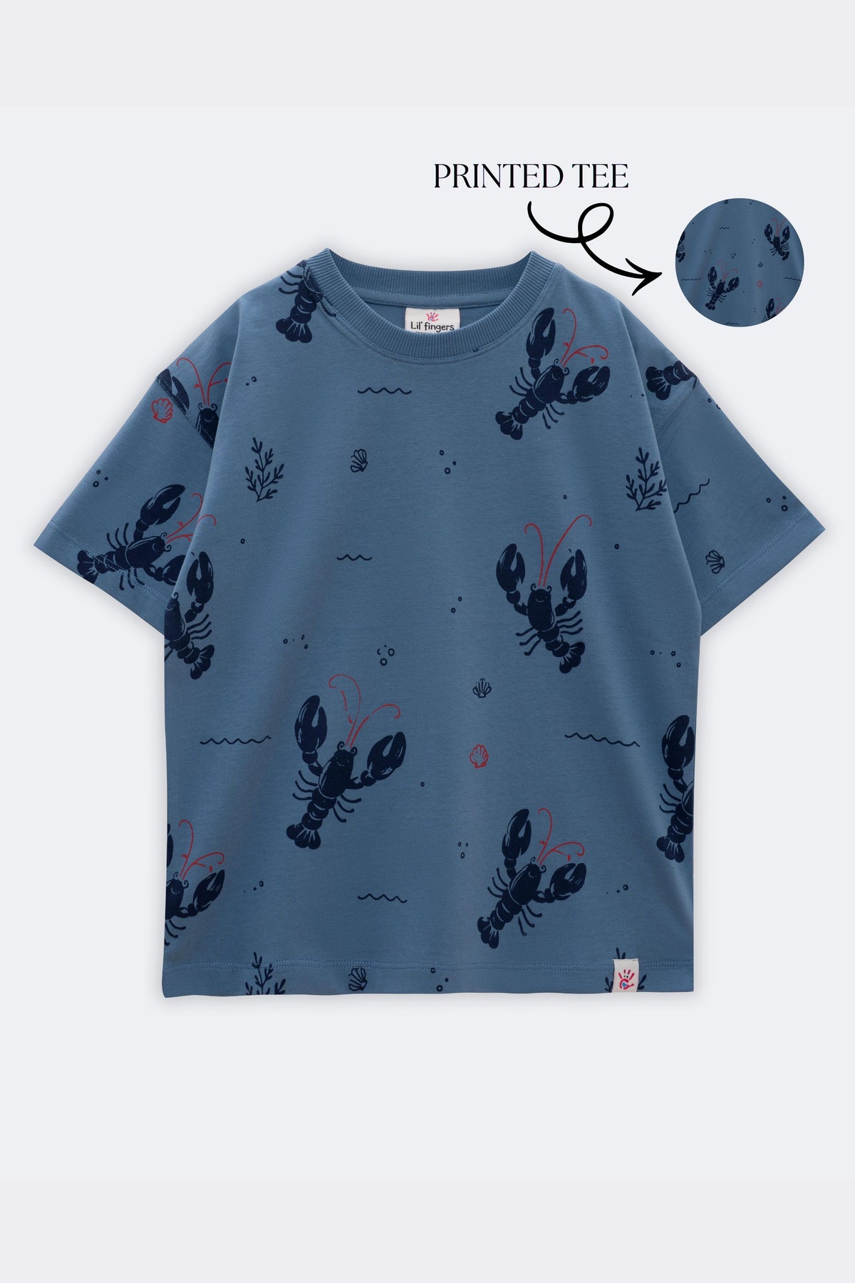 Light blue printed tee with scattered lobsters, waves, and red accents; short sleeves