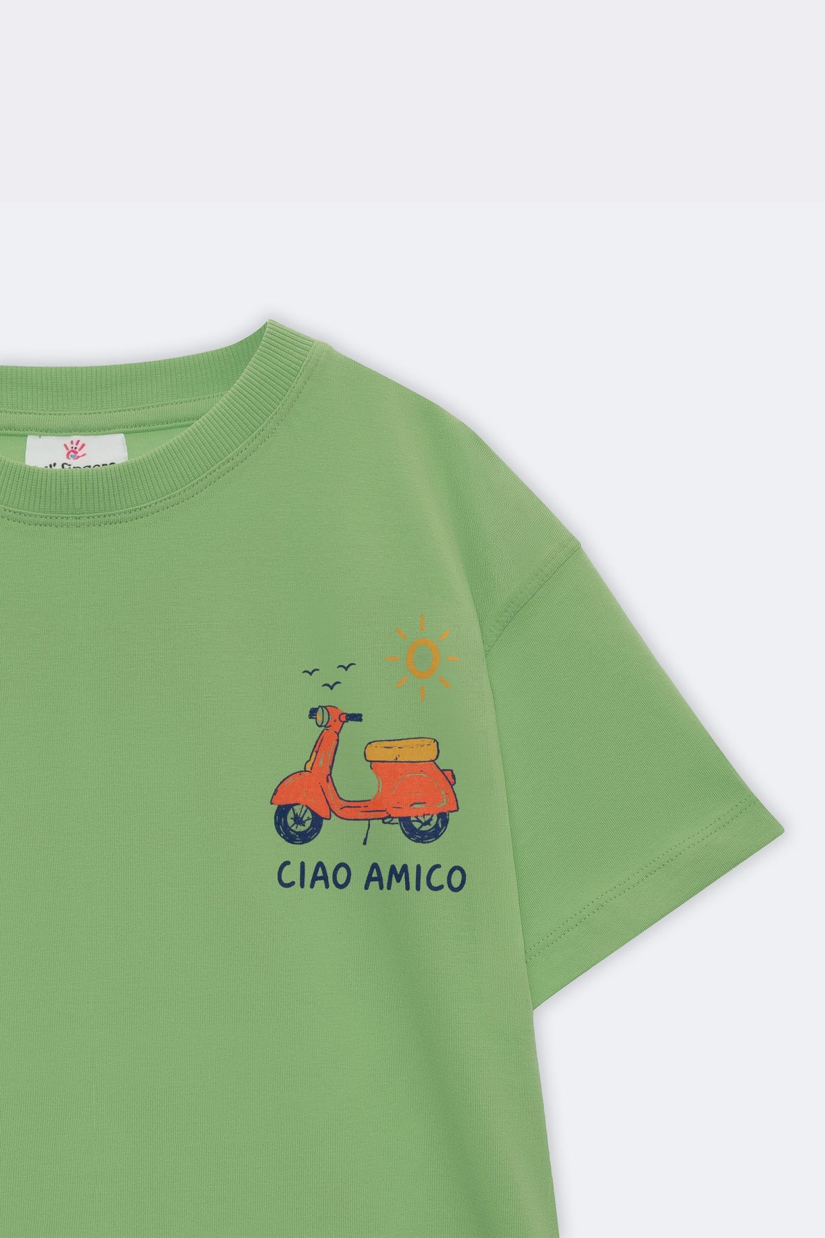 Green kids tee sleeve/side with scooter and “CIAO AMICO” chest graphic